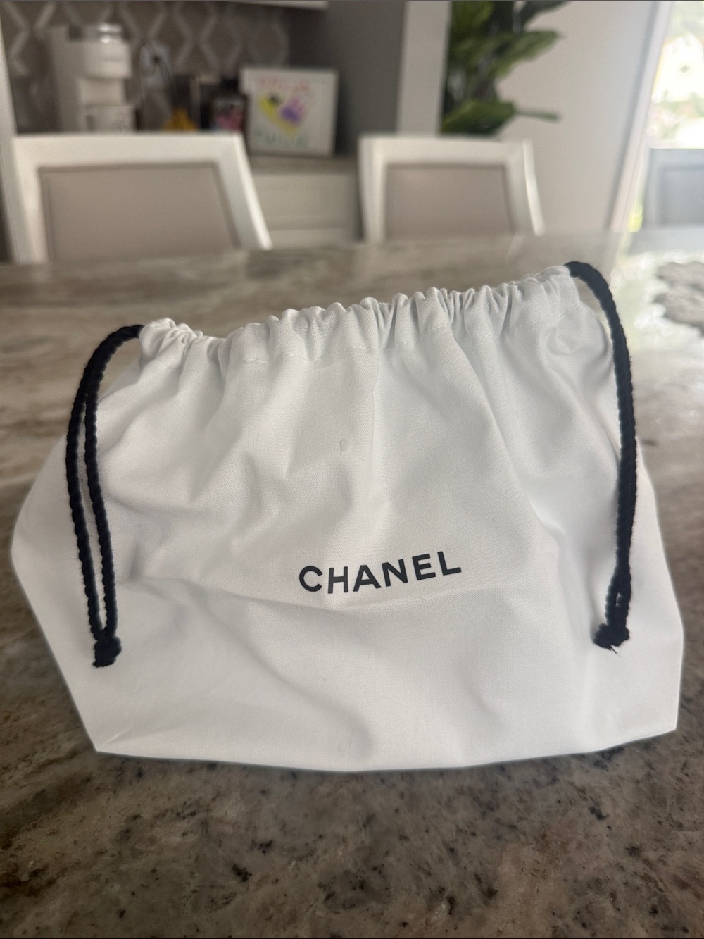 CHANEL White Pouch with Black Drawstring
